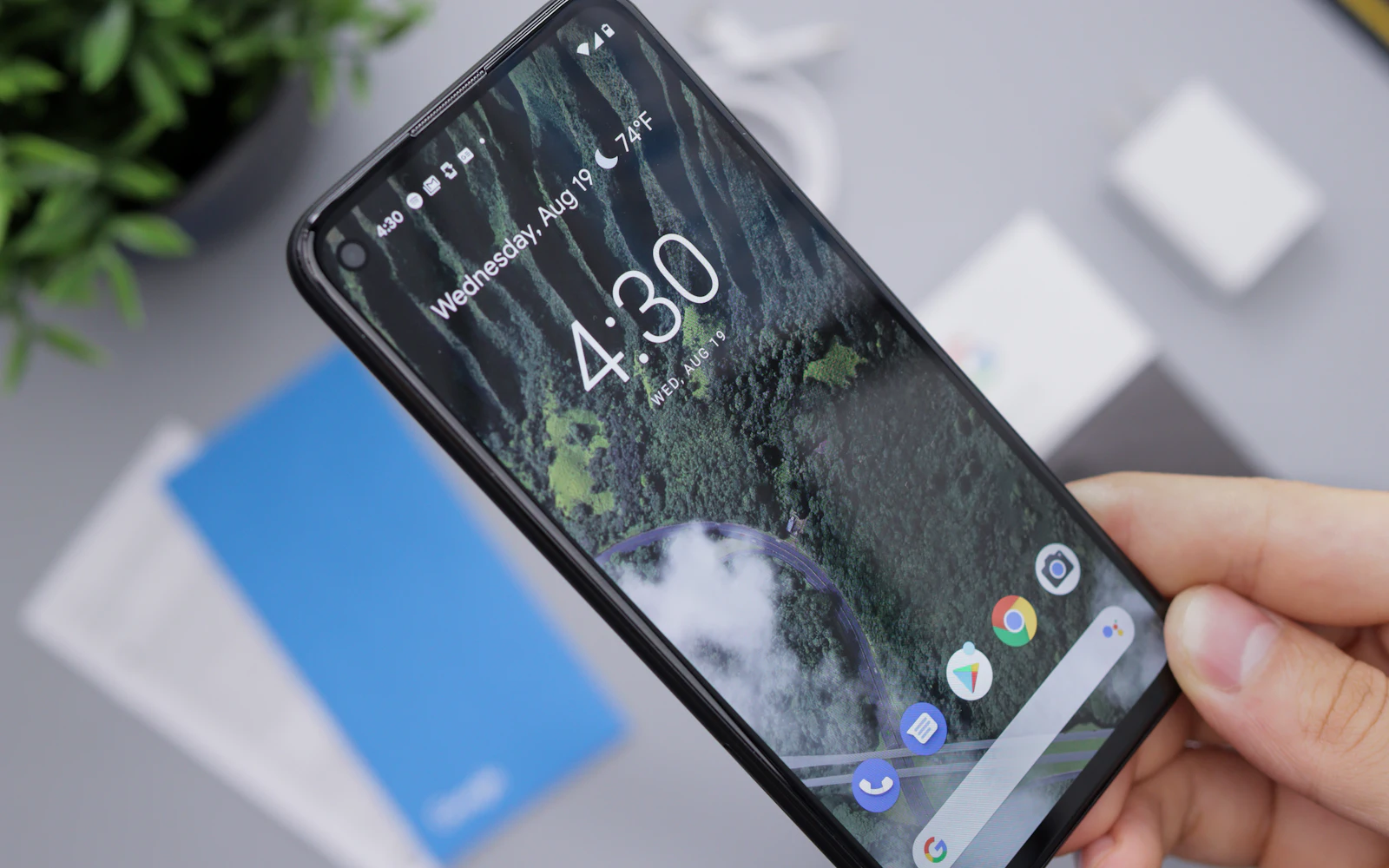 Person holding black android smartphone